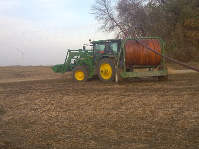 tractor spreading manure in Iowa